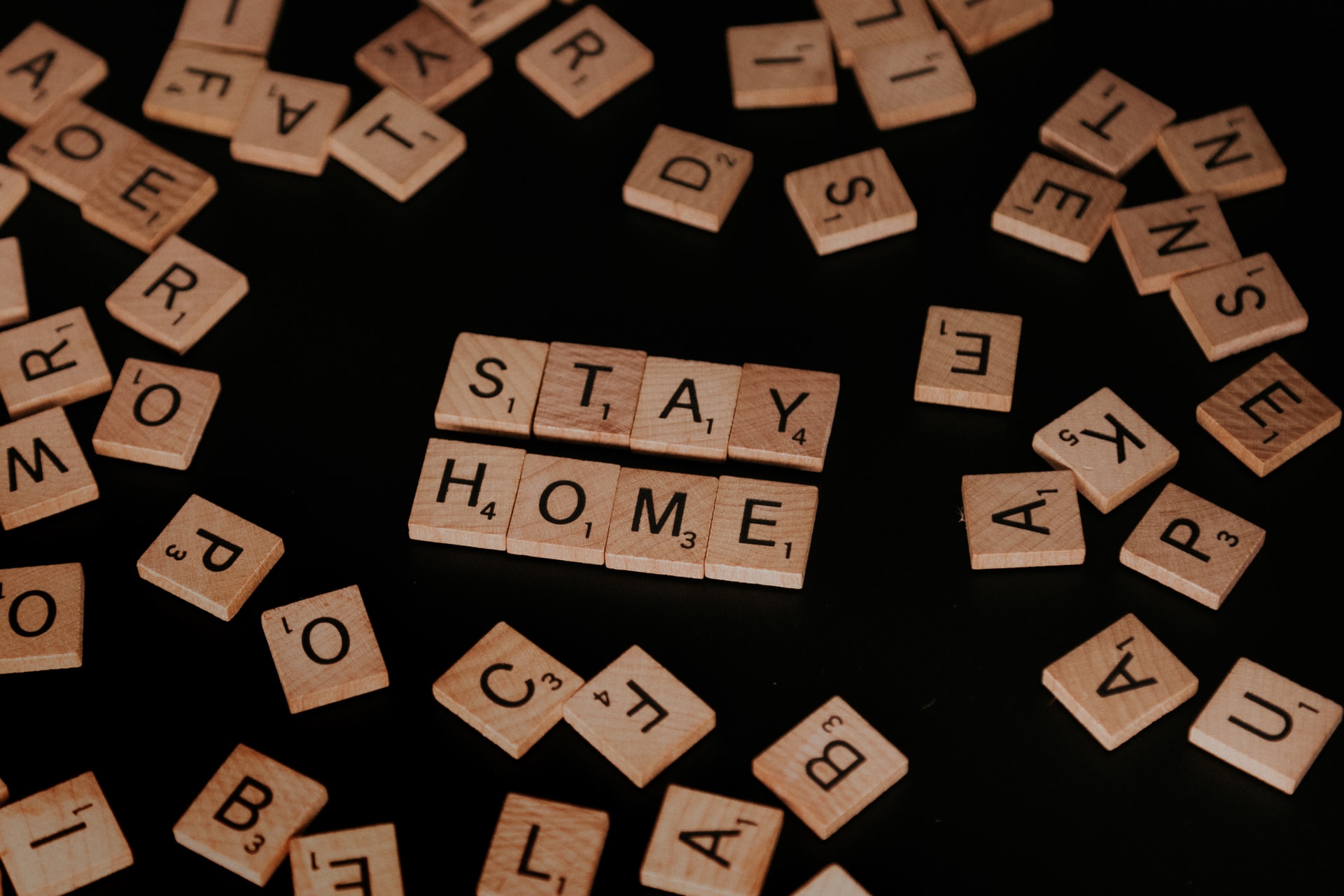 Scrabble tiles spelling stay home
